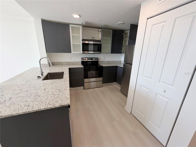 Building Photo - 5587 Millennia Park Dr