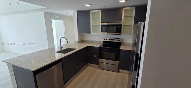 Foto del edificio - 5579 Millennia Park Dr