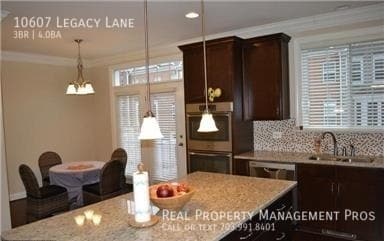 Photo - 10607 Legacy Ln Townhome
