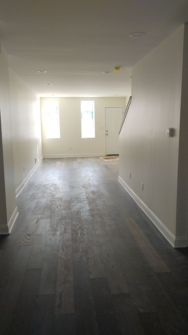 Building Photo - Showings begin soon!