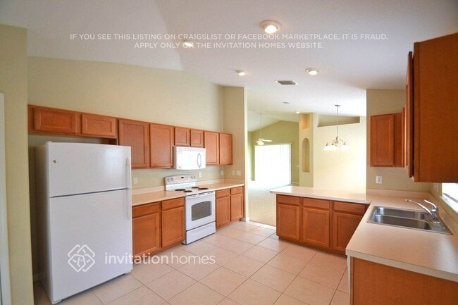 Foto del edificio - 8124 Alamosa Wood Ave