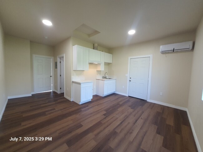 Living room / kitchen - 1221 W 152nd St