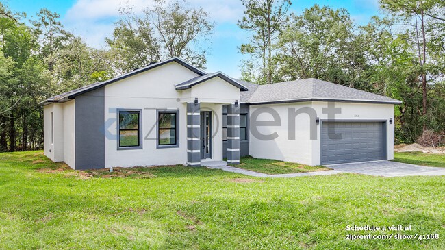 Building Photo - 8202 N Triana Dr