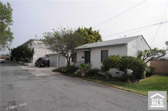 Building Photo - 9509-9511 Flower St