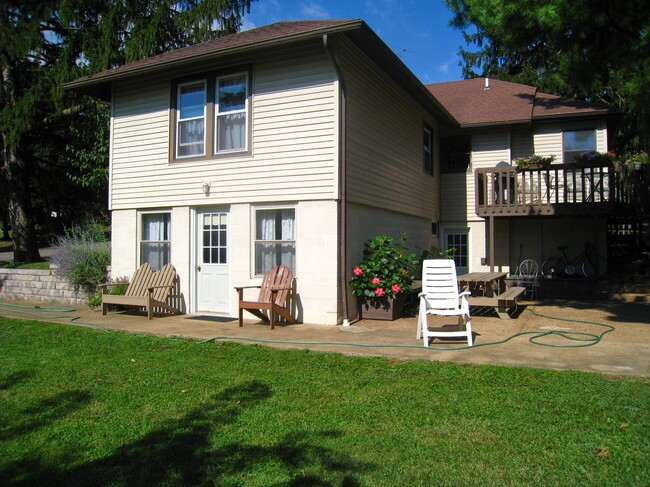 Back of house, patio, walkout basement entrance - 1190 Parkway Dr