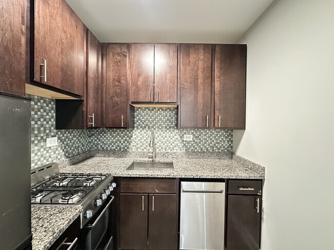 Foto del edificio - 4823 N Damen Ave