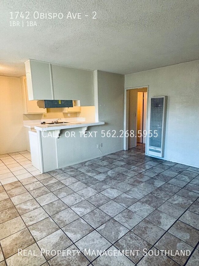 Building Photo - Spacious 1 BD + 1 Bath in gated building i...