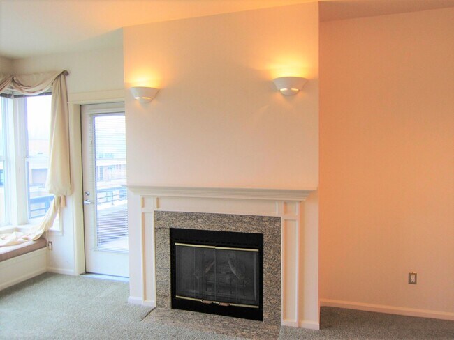 Large living room with electronic fireplace - 10042 Main St
