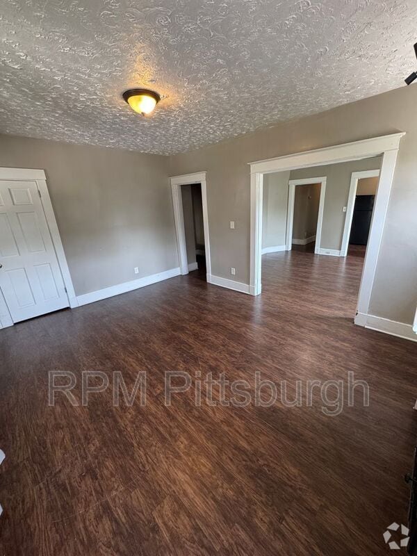 Building Photo - 311-313 W Burgess St