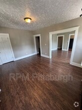 Building Photo - 311-313 W Burgess St