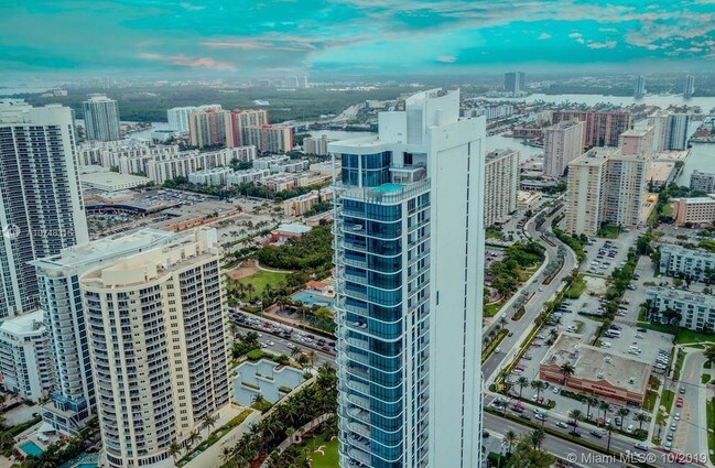 Building Photo - 17475 Collins Ave