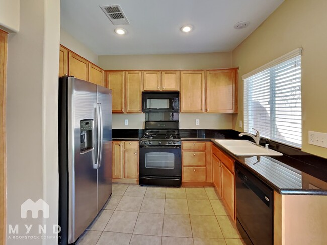 Building Photo - 8776 Charm Canyon Ave