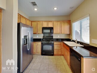 Building Photo - 8776 Charm Canyon Ave