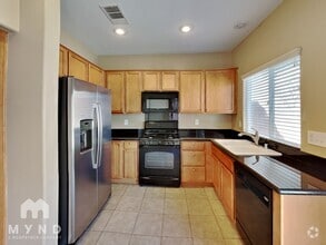 Building Photo - 8776 Charm Canyon Ave