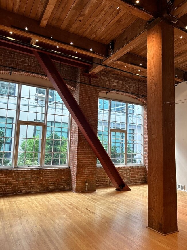 Building Photo - EXQUISITE BRICK & TIMBER LIVE/WORK LOFT IN...