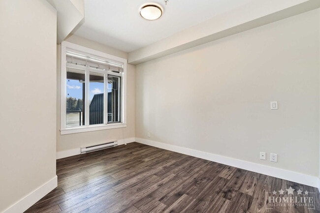 Photo du bâtiment - 1 - Bed + 1 - Bath + Den Condo for Rent in...