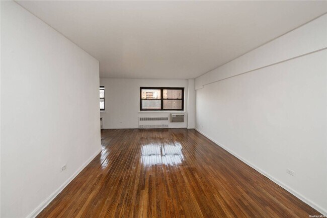 Building Photo - 94-30-94-58 58th Ave