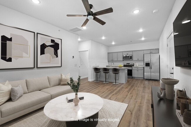 Open living area (virtually staged) - Bacardi on the Hill
