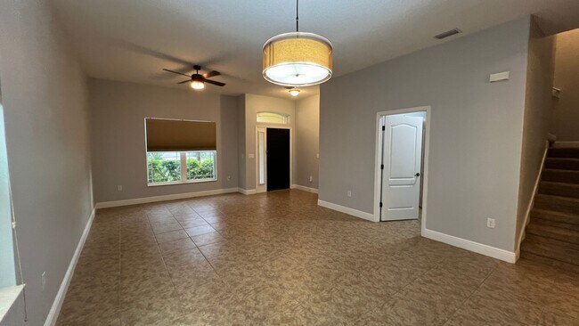 Building Photo - Serene Lakefront Living at Its Best! 4BD/3...