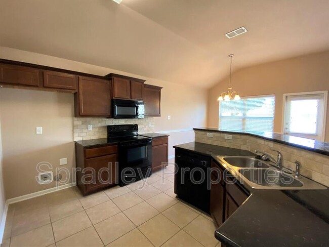 Foto del edificio - 7921 Bridgepointe Dr