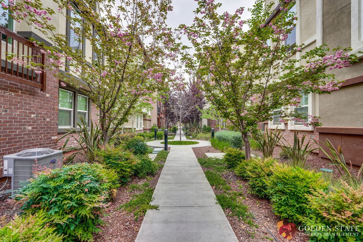 Primary Photo - Modern 2-Bed Condo with Tesla Charger & At...