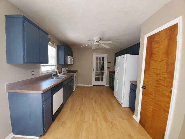 Foto del edificio - 6569 Green Meadow Ct