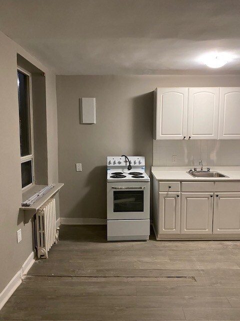 Photo du bâtiment - One Bedroom Apartment