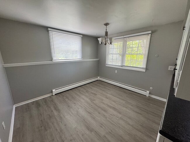 Building Photo - Two Bedroom Duplex with Heat Included! Nea...