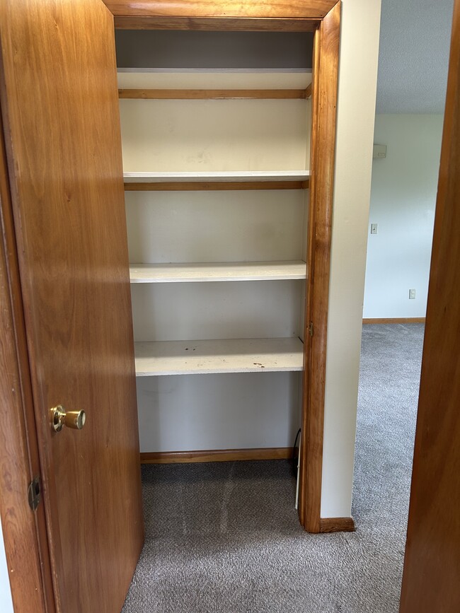 F 5 linen closet - Strnad Drive Apartments