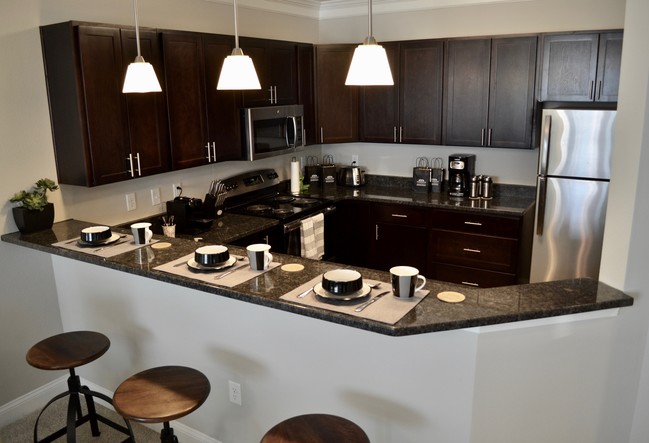 Granite Countertops | Stainless Steel Appliances - Stonegate at the Crossroads Apartments