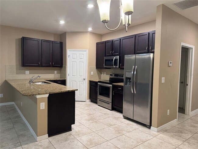 Building Photo - 26077 Sandhill Blvd
