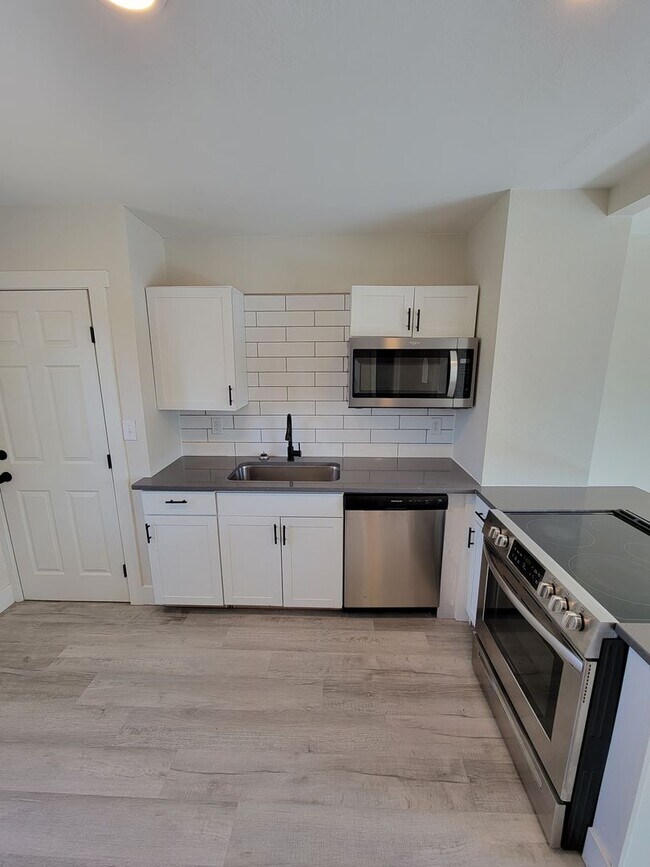 Foto del edificio - Theall Triplex