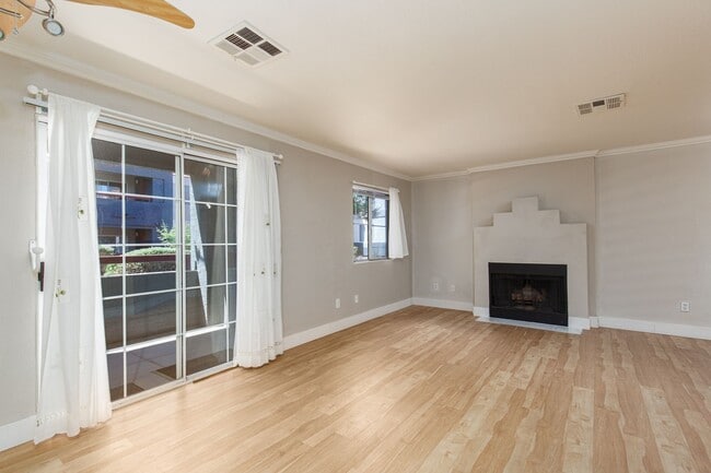 Building Photo - Remodeled first floor unit in gated commun...