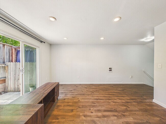 Building Photo - Updated 2 Bed / 1.5 Bath Townhome – In-Unit Washer & Dryer + Garage Parking – $2,800/month