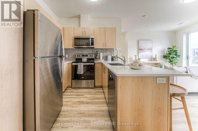 Photo du bâtiment - 301-301 Westmount Rd W