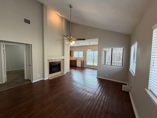 Building Photo - NICE 3 BR IN NEISD W/ WOOD VINYL COMPOSITION FLOORING*HIGH CEILINGS*FIREPLACE IN LIVING ROOM MAKE...