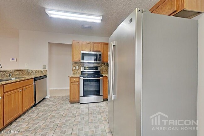 Building Photo - 7944 Cherry Blossom Dr S