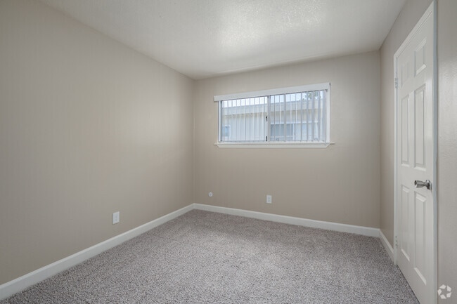 2BR, 1BA - 870SF - Second Bedroom - Sunridge Apartments