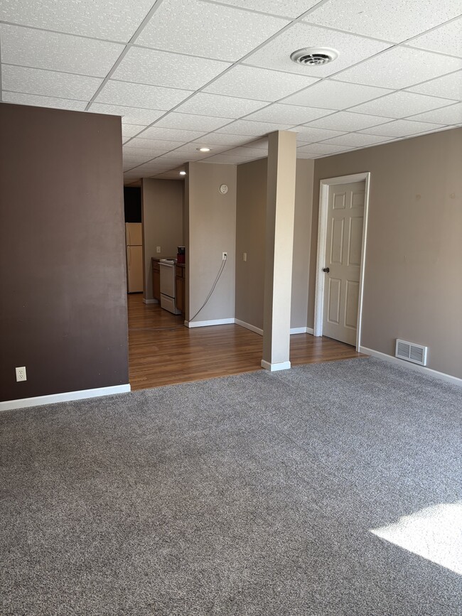 Livingroom looking to Kitchen & Bedroom 1 door - 211 E Franklin Street