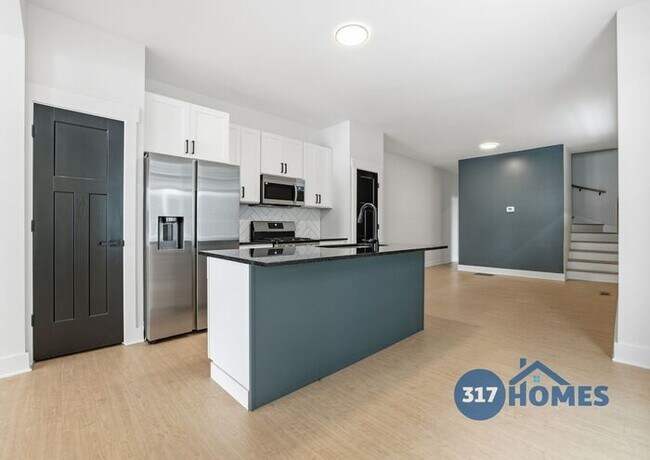 Foto del edificio - Spacious Four Bedroom Townhome with Main Level Suite in Holy Cross