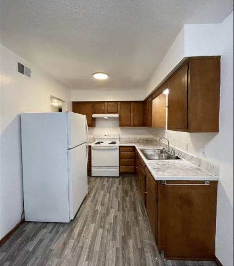 One Bedroom Kitchen - Wayland Square Apartments