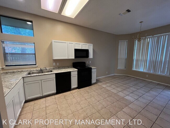 Foto del edificio - 3 br, 2.5 bath House - 9731 QUIET LAKE