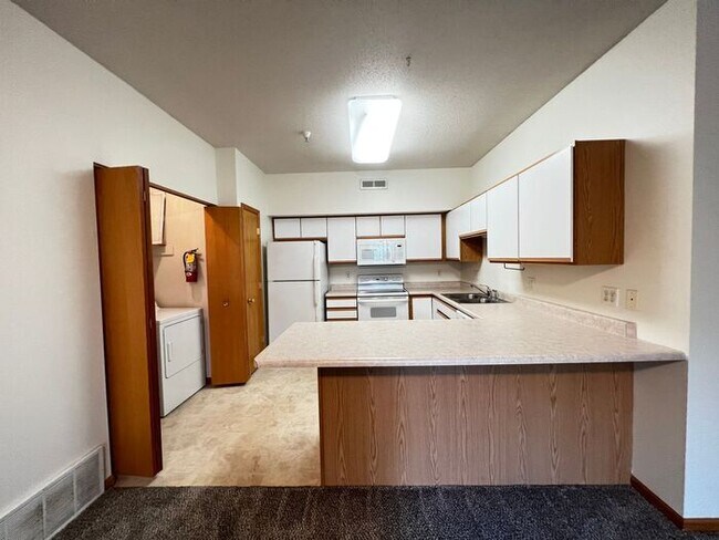 Building Photo - $1,395 | 2 Bedroom, 2 Bathroom Condo | Pets Negotiable | Available for an August 1st, 2026 Move In!