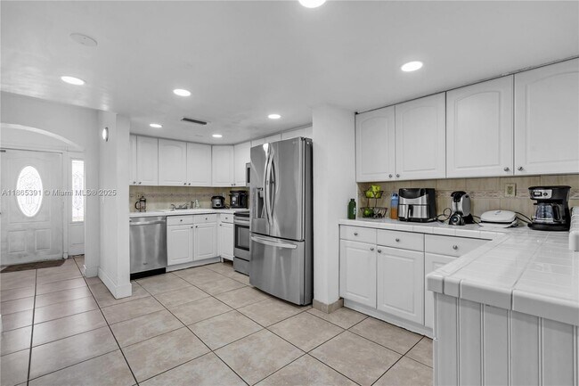 Foto del edificio - 4428 W 10th Ct