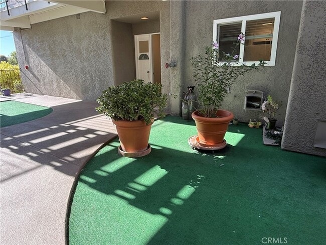 Photo - 2404 Via Mariposa W Unit Apartment