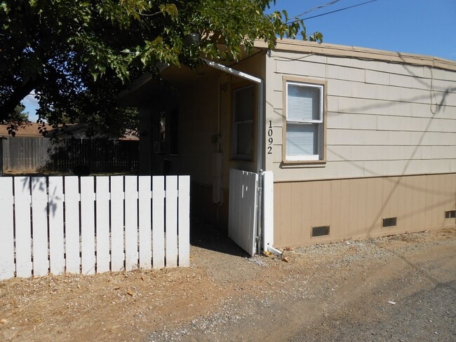 Building Photo - Home with Fenced Yards