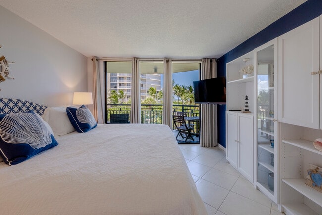 Primary Room with built in and TV - 2800 N Highway A1A