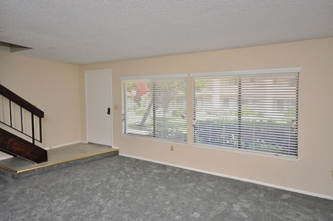 Building Photo - Bright Two-Story 3BR Condo with Spacious F...