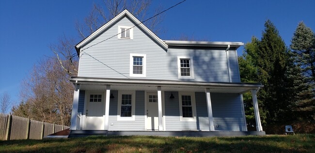 Front - apartment is upstairs, entry is door on the left - 21 W Hanover Ave
