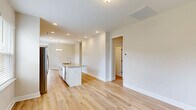 This well-designed single-story home offers 1,170 square feet of living space, including three bedrooms and two bathrooms. The property features a thoughtful open-concept layout, perfect for modern living. The heart of the home is the kitchen, which boasts white cabinetry, granite countertops, and stainless steel appliances, including a built-in microwave. Large windows throughout allow ample natural light to flood the space, creating a bright and airy atmosphere.

The home's flooring is a standout feature, with beautiful hardwood floors extending throughout the main living areas and bedrooms. The primary bedroom, measuring 220 square feet, offers a generous space for relaxation. The bathrooms are equipped with modern fixtures and ample counter space.

Additional amenities include a dedicated laundry room with new Whirlpool washer and dryer, and a garage for convenient parking and storage. The property also features multiple closets and storage areas, ensuring plenty of space for organization.

The exterior of the home includes a fenced backyard, providing a private outdoor space for relaxation or entertainment. Located at 304 Bedstone Dr in Navassa, NC, this home combines modern comfort with practical design, making it an ideal choice for those seeking a contemporary living space.